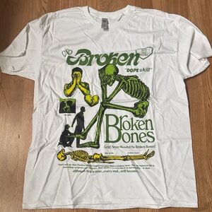 White T-Shirt with Green Skeleton Graphic